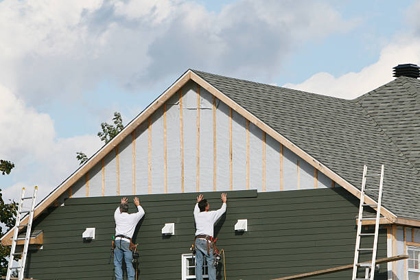 Professional Siding technician working in Dunkirk, IN